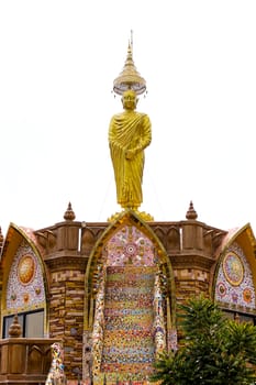 Buddha statue standing majestically on the high peaks of the practice.