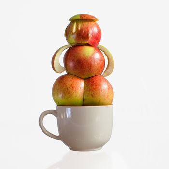 The rear view on a creative female figure from apples on a big mug with the handle