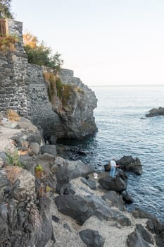 fisherman on the rocks ionian sea a