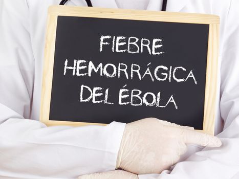 Doctor shows information: Ebola in spanish language