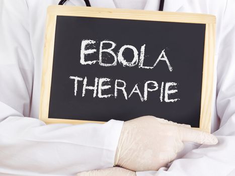 Doctor shows information: Ebola therapy in german language