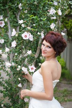 The young beautiful wife in the wedding day