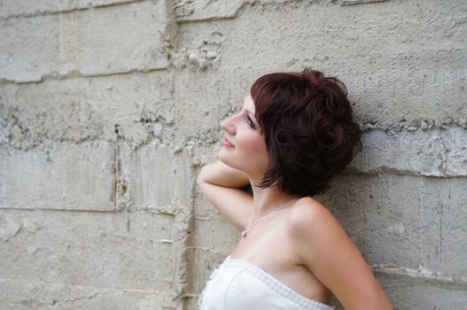 The young beautiful wife in the wedding day