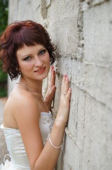 The young beautiful wife in the wedding day