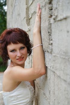 The young beautiful wife in the wedding day