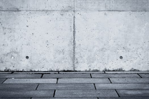 Grungy concrete wall and floor as background texture