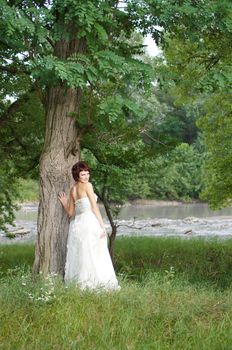 The young beautiful wife in the wedding day