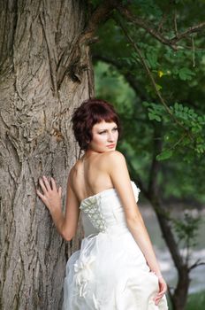 The young beautiful wife in the wedding day