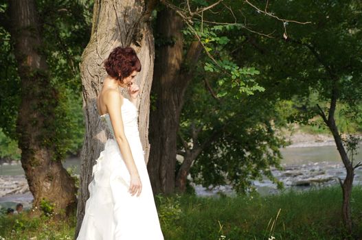 The young beautiful wife in the wedding day