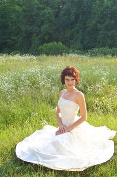 The young beautiful wife in the wedding day