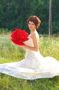 The young beautiful wife in the wedding day