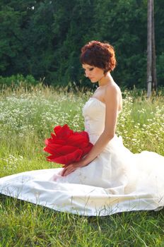 The young beautiful wife in the wedding day