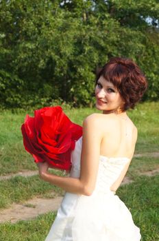 The young beautiful wife in the wedding day