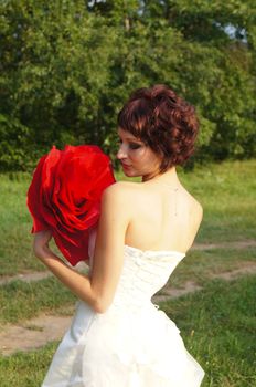 The young beautiful wife in the wedding day