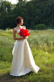 The young beautiful wife in the wedding day