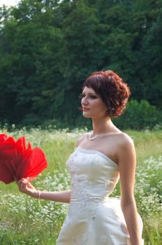 The young beautiful wife in the wedding day