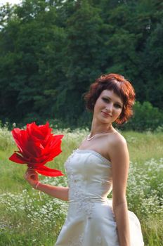 The young beautiful wife in the wedding day