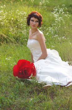 The young beautiful wife in the wedding day