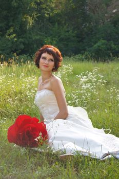 The young beautiful wife in the wedding day