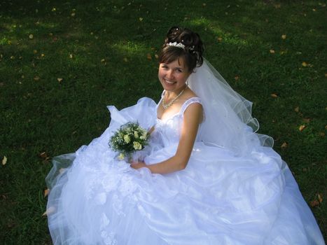 The young beautiful wife in the wedding day