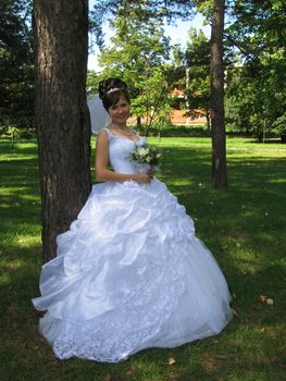 The young beautiful wife in the wedding day