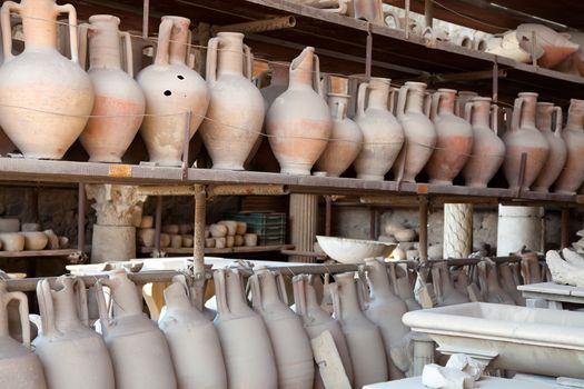 Pompeii antique pottery jugs. The city of Pompeii was an ancient Roman city. The eruption killed the city's inhabitants and buried it under tons of ash.