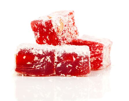 Sweet pieces of turkish delight on white background
