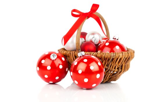 red polka dot Christmas bauble, isolated over white