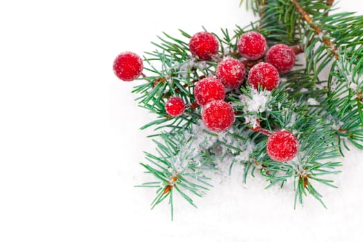 fir branches with Christmas decorations, isolated over white