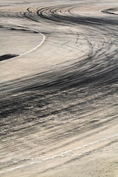 Background with tire marks on road track