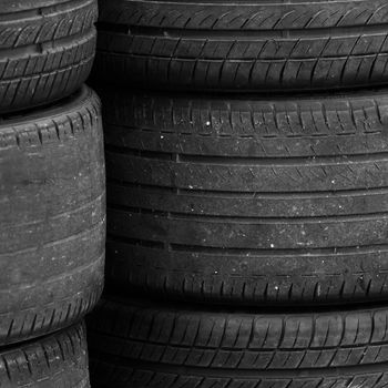 Pile of old rubber tires for background