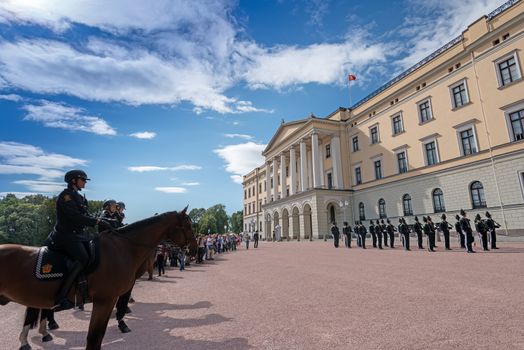 OSLO - AUGUST 28: In Oslo, His Majesty King's Guard keeps The Royal Palace and Royal Family guarded 24 hours day. Every day at 1330 hrs, there is Change of Guards outside Palace. Pictured on August 28, 2014