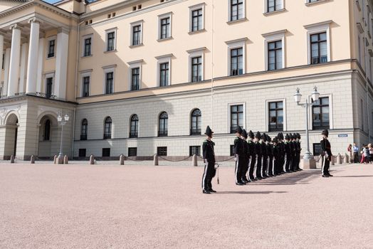 OSLO - AUGUST 28: In Oslo, His Majesty King's Guard keeps The Royal Palace and Royal Family guarded 24 hours day. Every day at 1330 hrs, there is Change of Guards outside Palace. Pictured on August 28, 2014