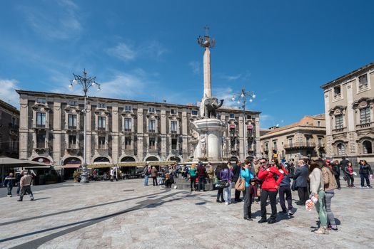 CATANIA, ITALY - APRIL 4: Piazza del Duomo in Catania with Cathedral of Santa Agatha on April 4, 2014 in Catania, Sicily, Italy. Catania founded in the 8th century BC