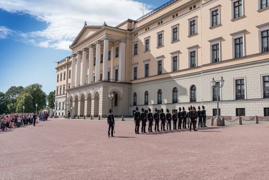 OSLO - AUGUST 28: In Oslo, His Majesty King's Guard keeps The Royal Palace and Royal Family guarded 24 hours day. Every day at 1330 hrs, there is Change of Guards outside Palace. Pictured on August 28, 2014