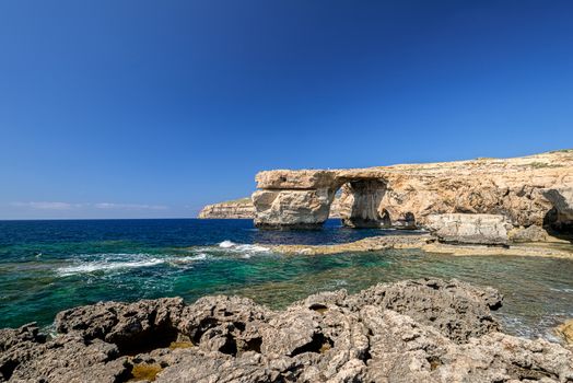 Azure Window, famous stone arch of Gozo island in the sun in summer, Malta