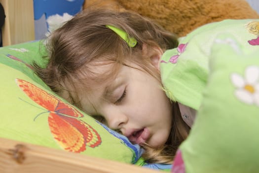 Four-year-old girl was asleep in his crib in the nursery