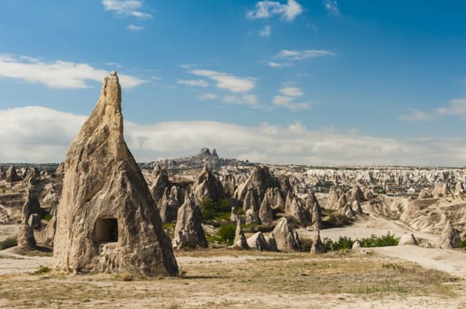 Spectacular teeth-like rock formation and old christian caves near Uchisar castle, Cappadocia, Turkey