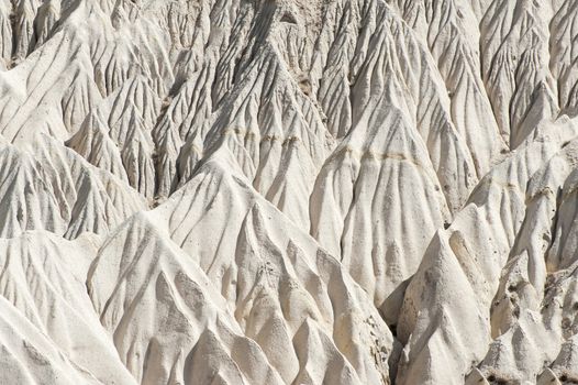Detailed photo of white rock formations from above in Cappadocia, Turkey
