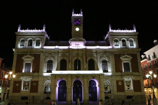 The illuminated City Hall of Valladolid at night in Spain