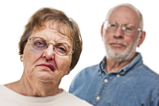 Battered and Scared Woman with Ominous Angry Man Behind.