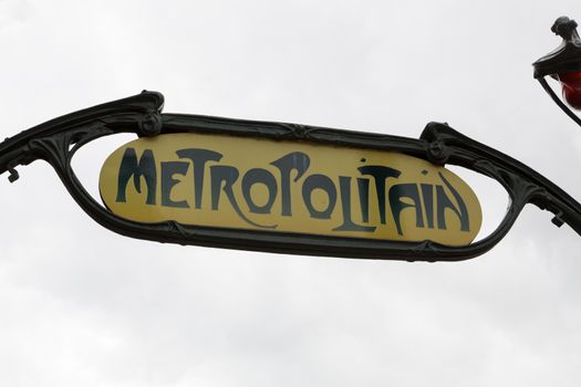 Ancient Metro Sign at the entrance of the Paris Metro