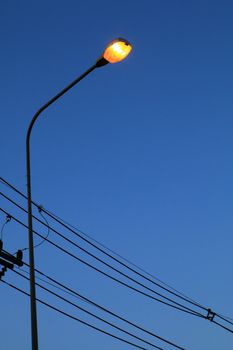 The streetlamp turn on the light automatically when dark.