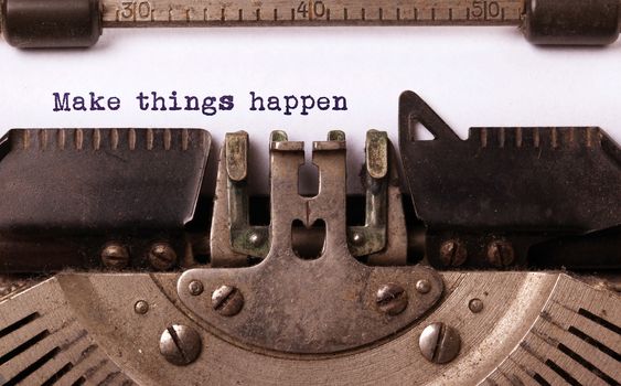 Vintage inscription made by old typewriter, Make things happen