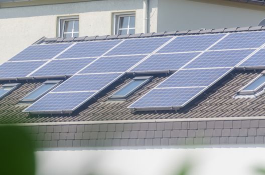 Renovated house, on the roof  a photovoltaic system.