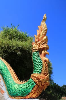 The sculpture king of nagas usually decor at the stair in public temple of Thailand.
