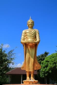 The large buddha image holding an alms bowl in the public temple in Thailand.