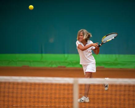 Children at school during a dribble of tennis