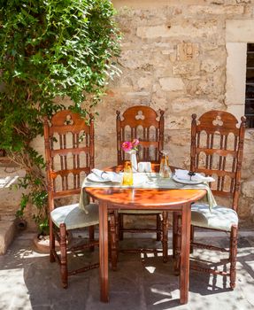Interior of open air restaurant in Crete