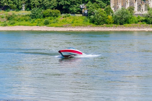 Speedboat cruising in the lake.
